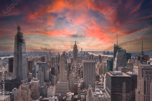 New York, United States "; January 5, 2020: Sunset in Top of the Rock in New York, beautiful view of the Empire State and its surroundings.