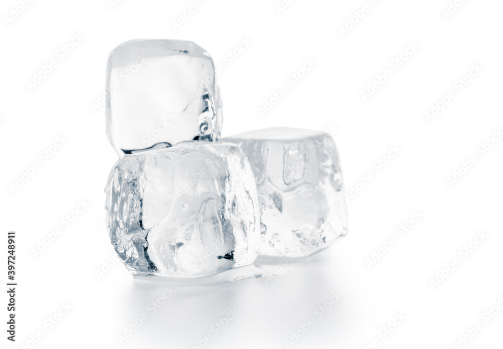 Natural ice cubes on white surface. Purity and refreshment concept. Natural ice cubes on white surface. Purity and refreshment concept.