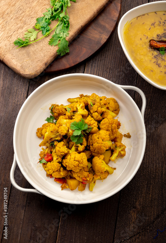 traditional indian meal lentil soup, flat bread and cauliflower vegetable, dal, roti and sabzi photo