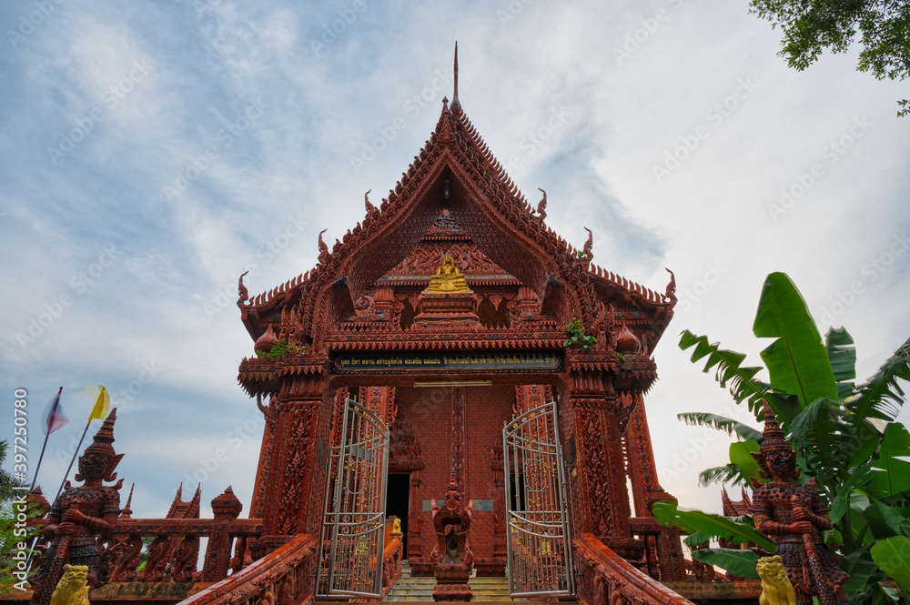 Chachoengsao / Thailand / September 4, 2020 : Wat Nakhon Nueang Khet (Wat Ton Taan), Temple covered in red clay tiles. It is a peaceful temple, not many people personally like it. Beautiful temple..