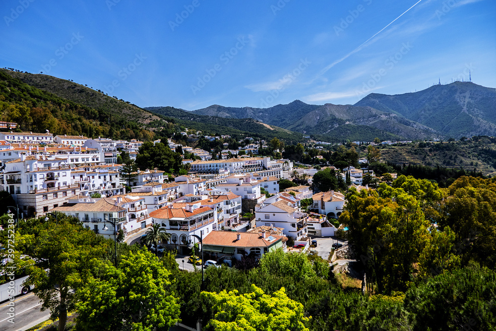 Beautiful aerial view of Mijas - Spanish hill town overlooking the Costa del Sol, not far from Malaga. Mijas known for its white-washed buildings. Mijas, Andalusia, Spain.
