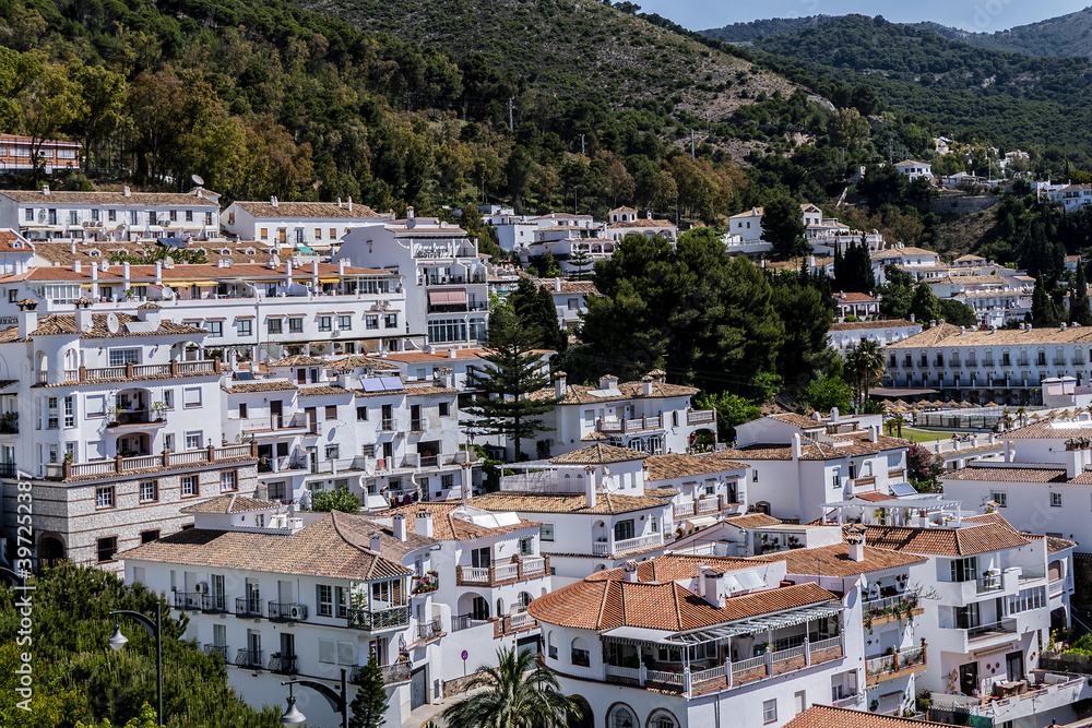Beautiful aerial view of Mijas - Spanish hill town overlooking the Costa del Sol, not far from Malaga. Mijas known for its white-washed buildings. Mijas, Andalusia, Spain.