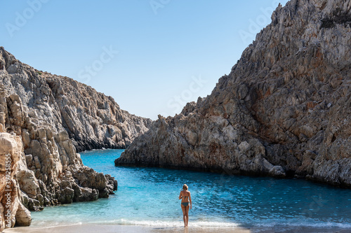 Fotografie Beautiful girl in bikini suit on Seitan limania also known as Stefanou beach on Crete, Greece