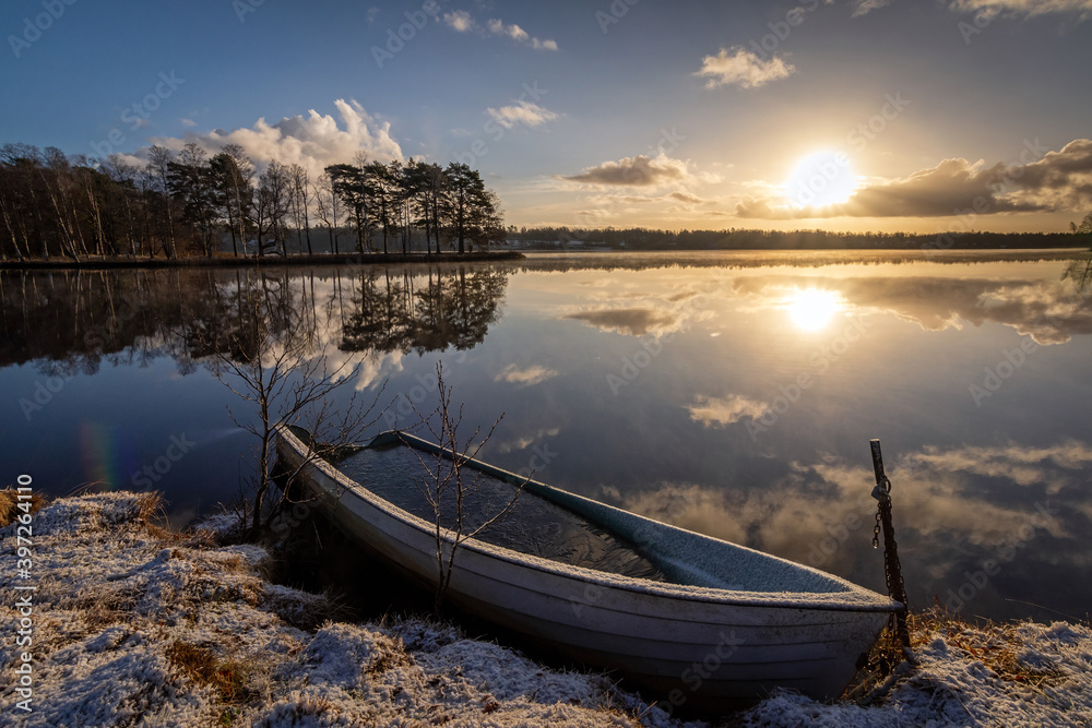 Swedish boat in lake winter scenery