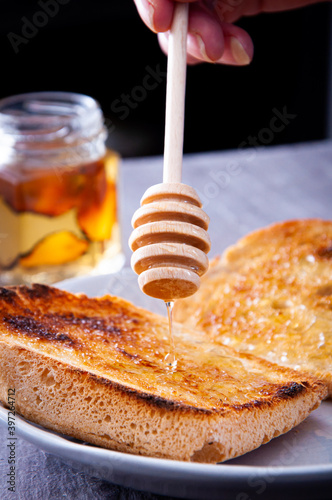 Φωτογραφία Jar of raw honey infused with truffle