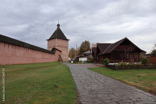 View of the old red brick fortress with towers 
