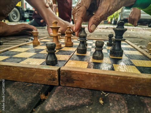 playing chess by the side of the road wastes time