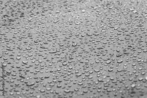 Water drops on smooth surface of waterproof fabric