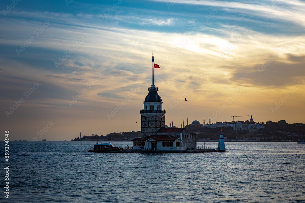 Istanbul, Turkey - September 2020:Maiden's Tower or Kiz Kulesi located in the middle of Bosporus in the beautiful twilight