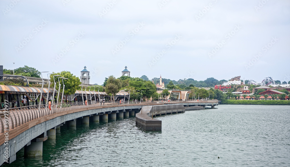 View of Sentosa Gateway. On the embankment tourists stroll