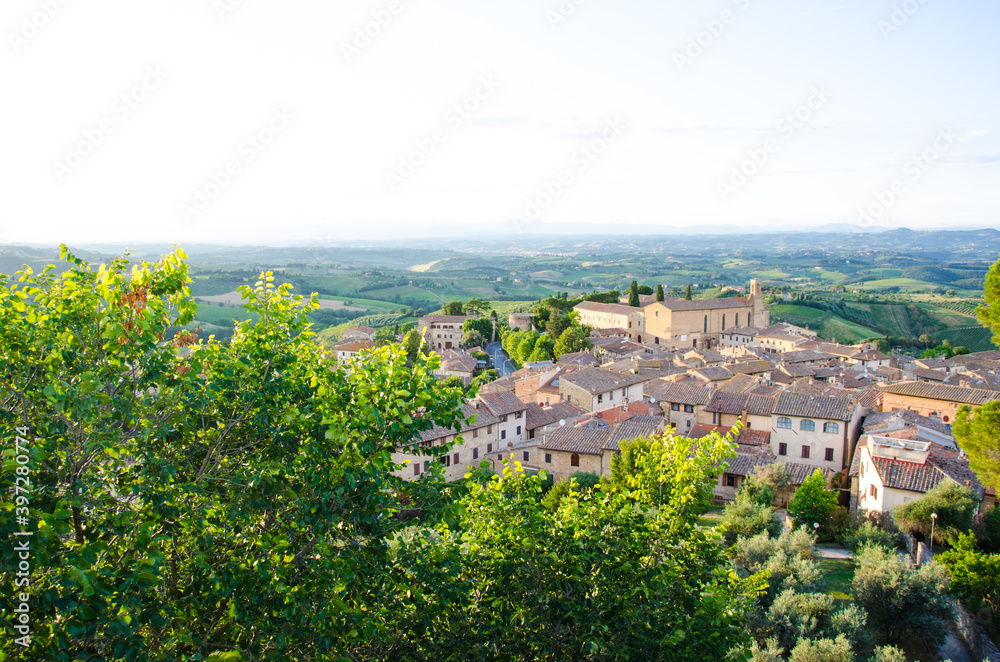 A Tuscan landscape with Sant'Agostino church in San Gimignano, Italy