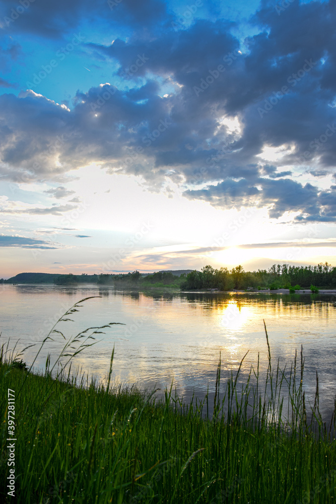 Sunset in Kazimierz Dolny, Poland. Duck floating on the Vistula River.