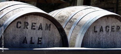 old beer barrels with black background