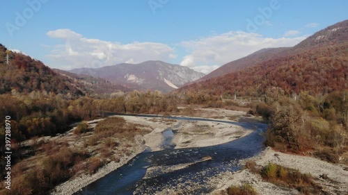 Aerial View Drone Flight Over Fantastic Canyon Mountain River Dramatic Autumn Nature Landscape Green Meadows Orange Hills Pine Tree Forests. 4k