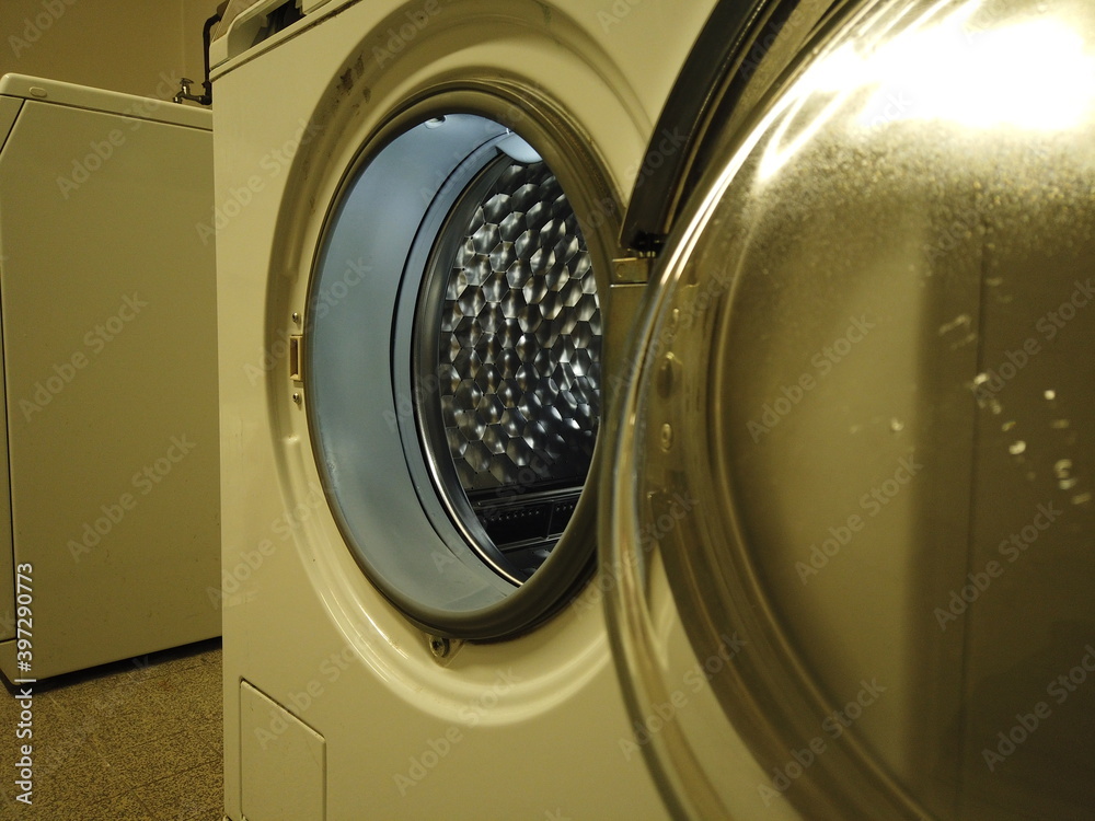 The laundromat door is open. The laundromat door is open.