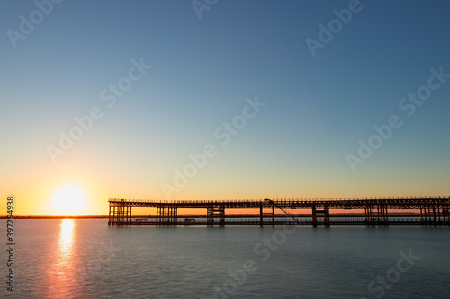 Mining pier known as the Tinto Dock  at sunset  Muelle del Tinto . This is one of the remains left by the English in Huelva.