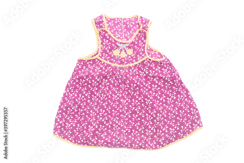Retro style baby girl dress isolated on the white background top view.