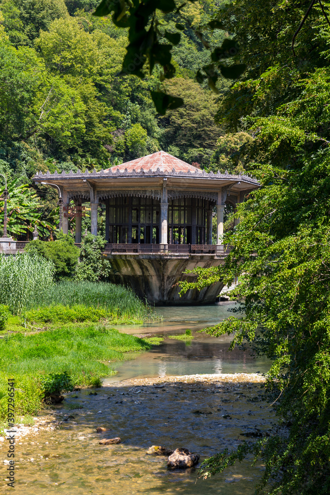 Beautiful landscape with old pavilion on the water