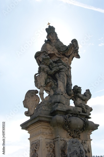 One of the statues of the famous Charles Bridge in Prague