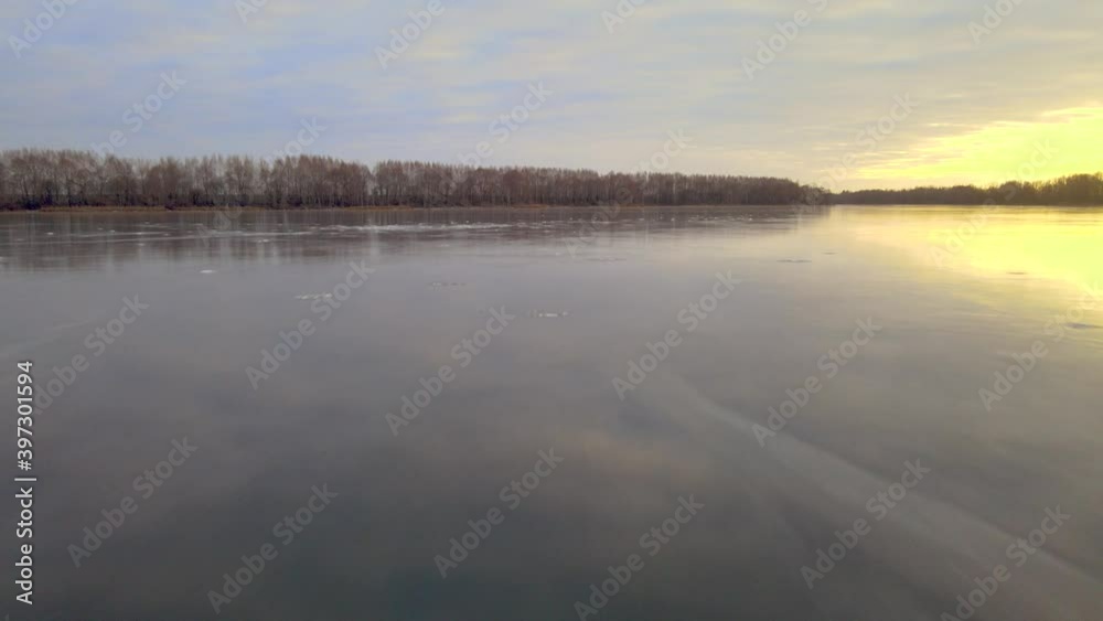 flying over a frozen lake in extreme cold. flying over a frozen lake in extreme cold.