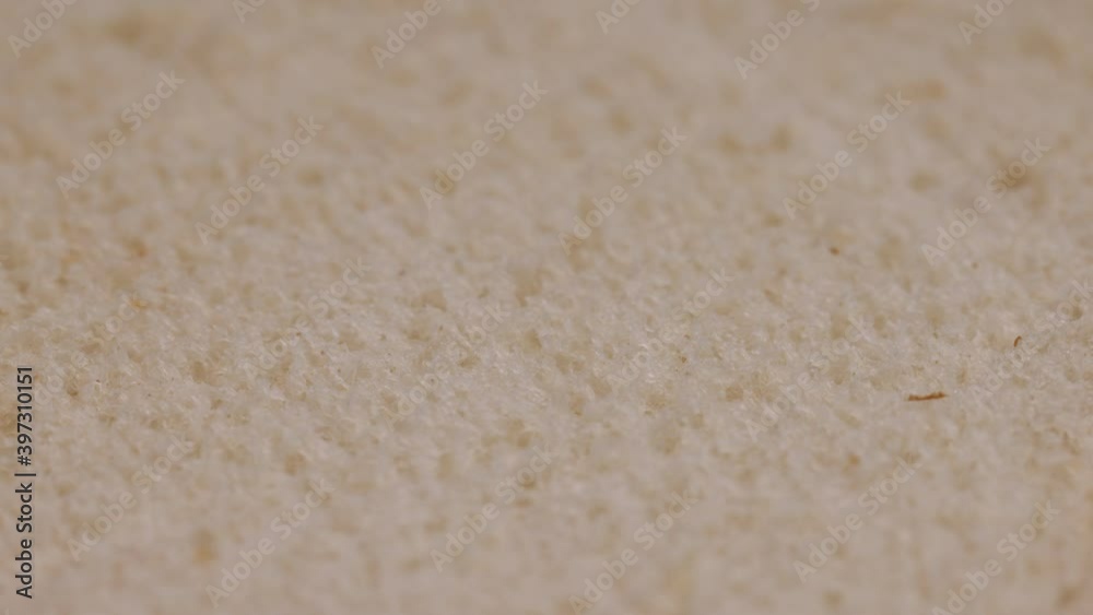 Close up view of spinning bread surface nooks crannies and crumbly air pockets. Close up view of spinning bread surface nooks crannies and crumbly air pockets.