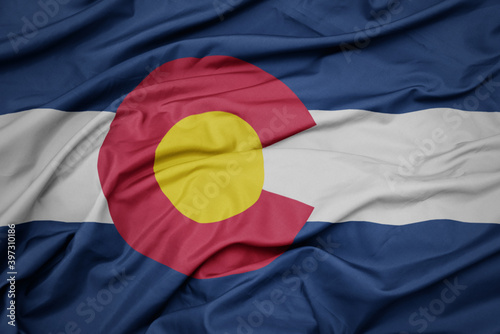 waving colorful flag of colorado state. photo