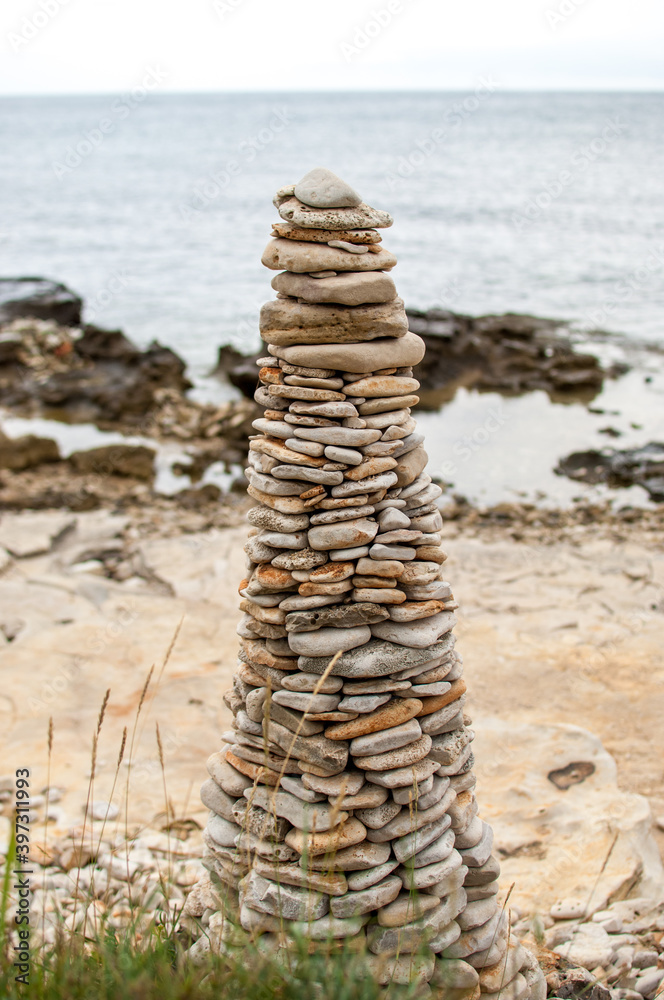 Stack of pebble stones formed as a tower Stack of pebble stones formed as a tower