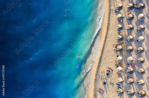View on beach and waves. Vacation and adventure. Landscape from drone on blue sea. Travel and vacation. Natural seascape at the summer time.