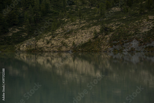 Fototapeta Naklejka Na Ścianę i Meble -  mirror surface of high mountain lake Akkem