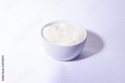 Mayonnaise swirl in white bowl. 