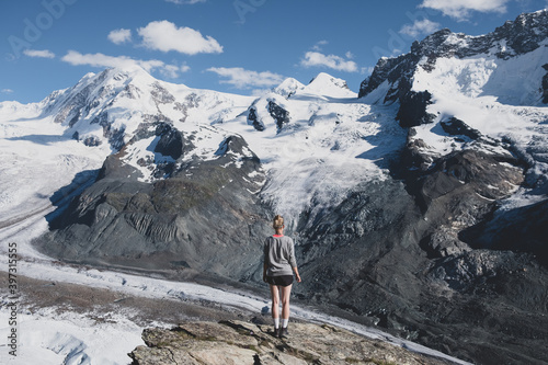 Traveler overlooking the glacier