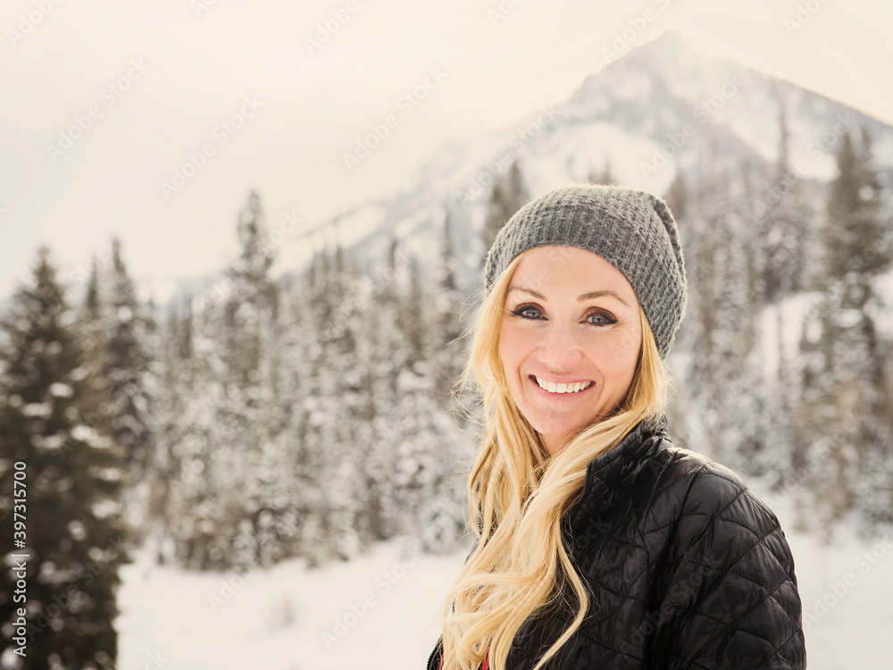 Caucasian woman smiling in snow Caucasian woman smiling in snow