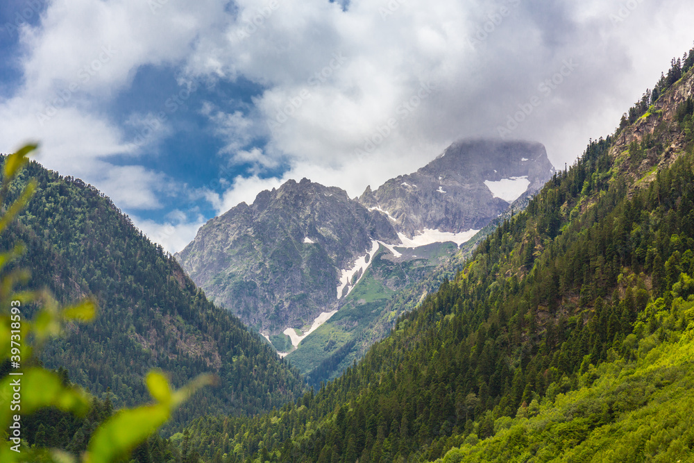 Fototapeta premium Beautiful mountain landscape with forest and clouds at Caucasus mountains.