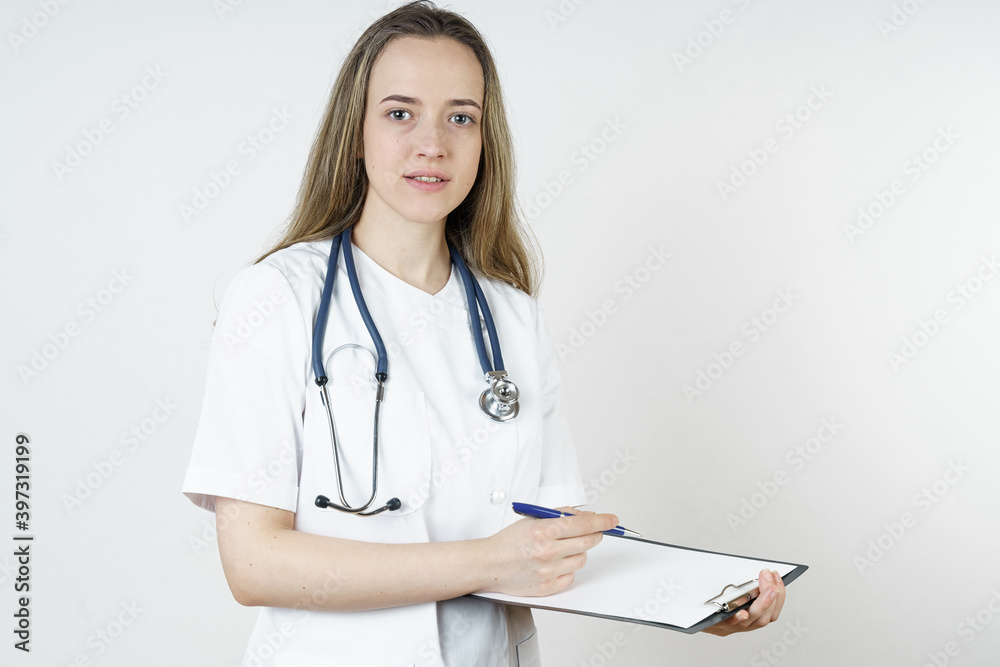 Medicine and health concept. The doctor writes the information into the tablet. Medicine and health concept. The doctor writes the information into the tablet.