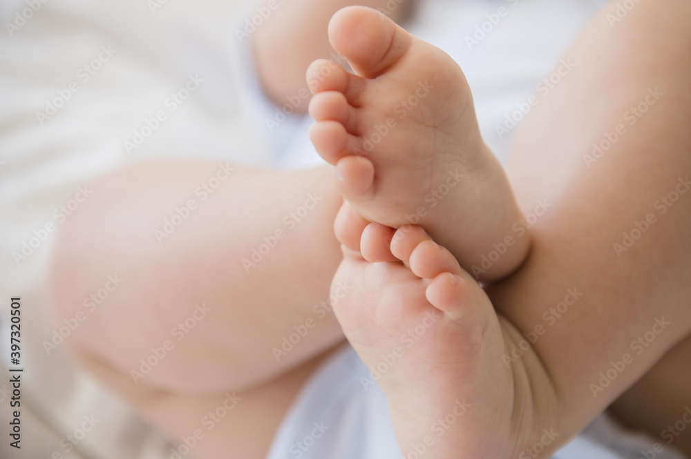 Close up of feet of mixed race baby Close up of feet of mixed race baby