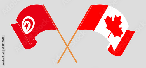 Crossed and waving flags of Tunisia and Canada