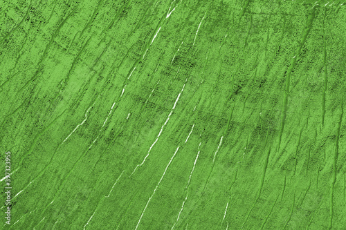 Abstract green background with cracks. Grunge background.