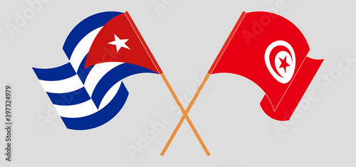 Crossed and waving flags of Cuba and Tunisia