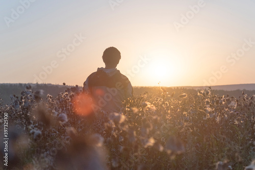 Mari man standing in field