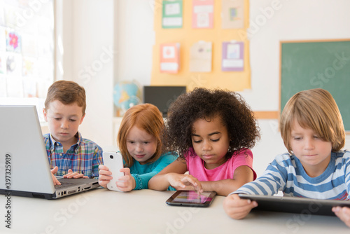 Students using technology in classroom photo
