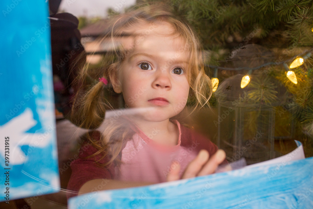 Serious Caucasian girl leaning on window Serious Caucasian girl leaning on window