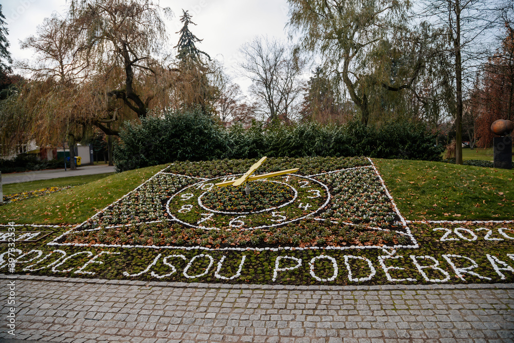 Romantic flowers clock in park is one of the most important symbols of historical spa town, Podebrady, Central Bohemia, Czech Republic