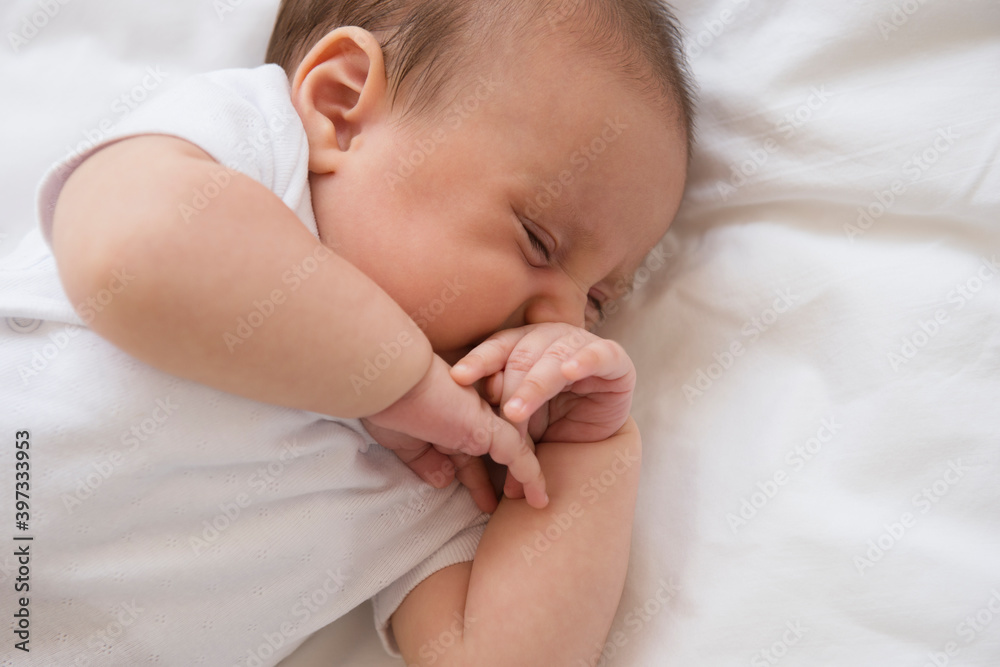 Baby girl (2-5 months) sleeping in bed Baby girl (2-5 months) sleeping in bed