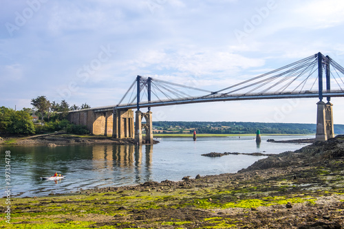 Treguier, France - August 24, 2019: the suspension bridge Pont de Lezardrieux across the Trieux river in Cotes-d-Armor department in Brittany
