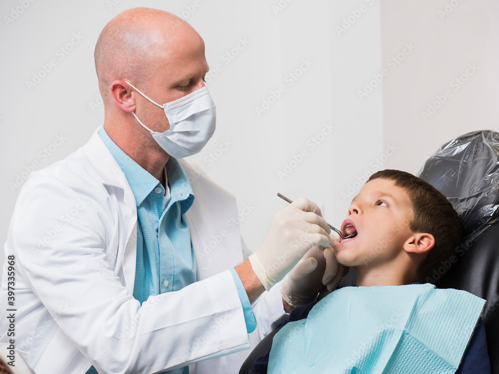 Dentist checking mouth of patient( 12-13) Dentist checking mouth of patient( 12-13)