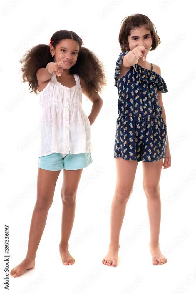 Two small girls pointing at the camera Two small girls pointing at the camera