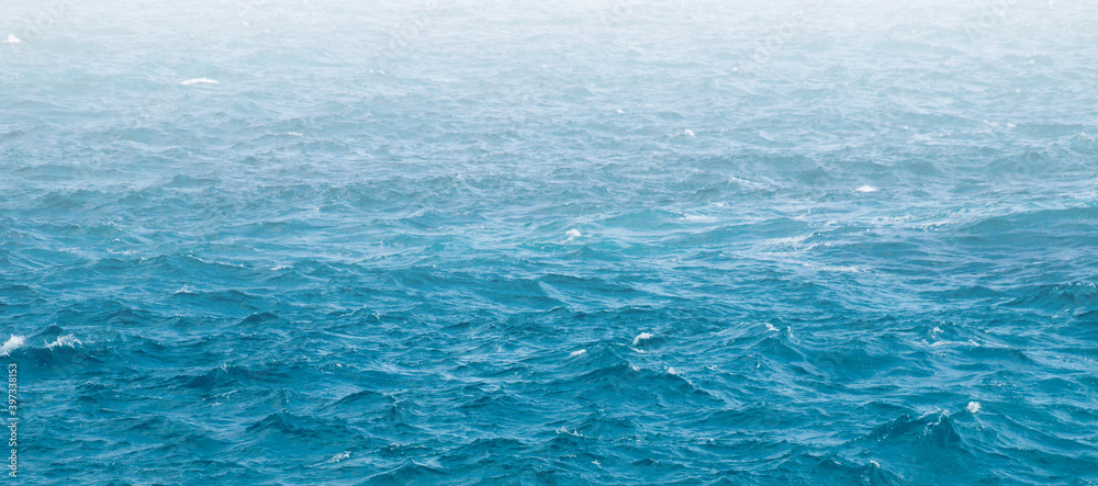 texture of blue sea water surface background
texture of blue sea water surface background