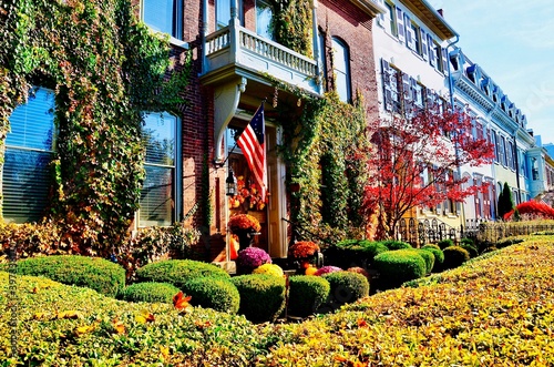 Cityscape of Geneva, New York. Historic row houses in downtown. Well maintained buildings, colorful paintings, beautiful gardens. A charming small town in America, has been on Playful City USA list.