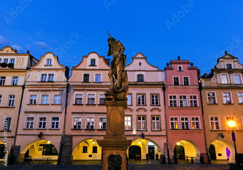 Statues and facades of old town houses photo