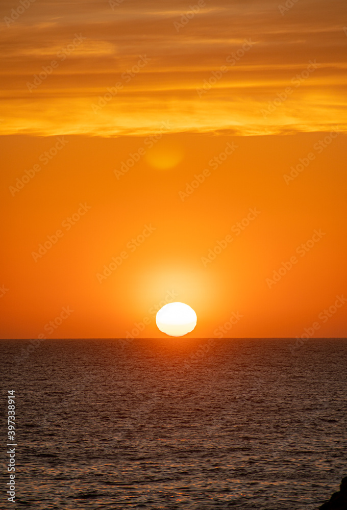 Sunset on the horizon of the sea